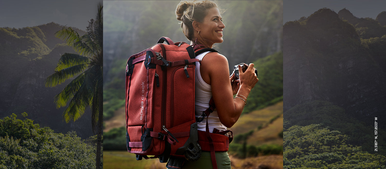 A woman in Hawaii with a red Gear Warrior Convertible Backpack