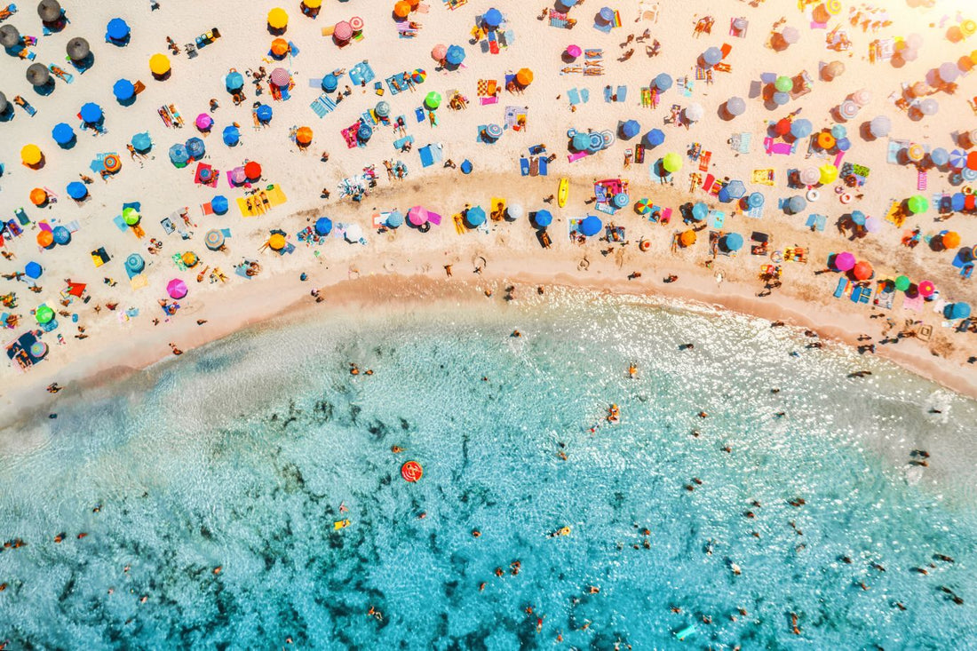 sandy beach with colorful umbrellas