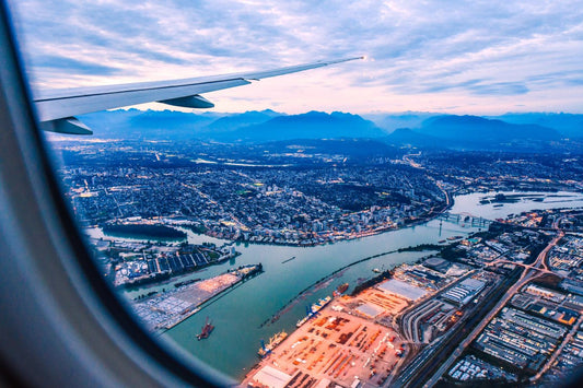 plane window looking out at city